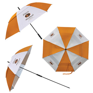Orange and white umbrella with Tito's Handmade Vodka logos