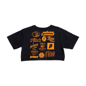 Back of black crop top with Tito's Vodka and Prince logos in orange