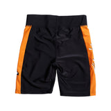 Back of black shorts with orange paneling on both legs