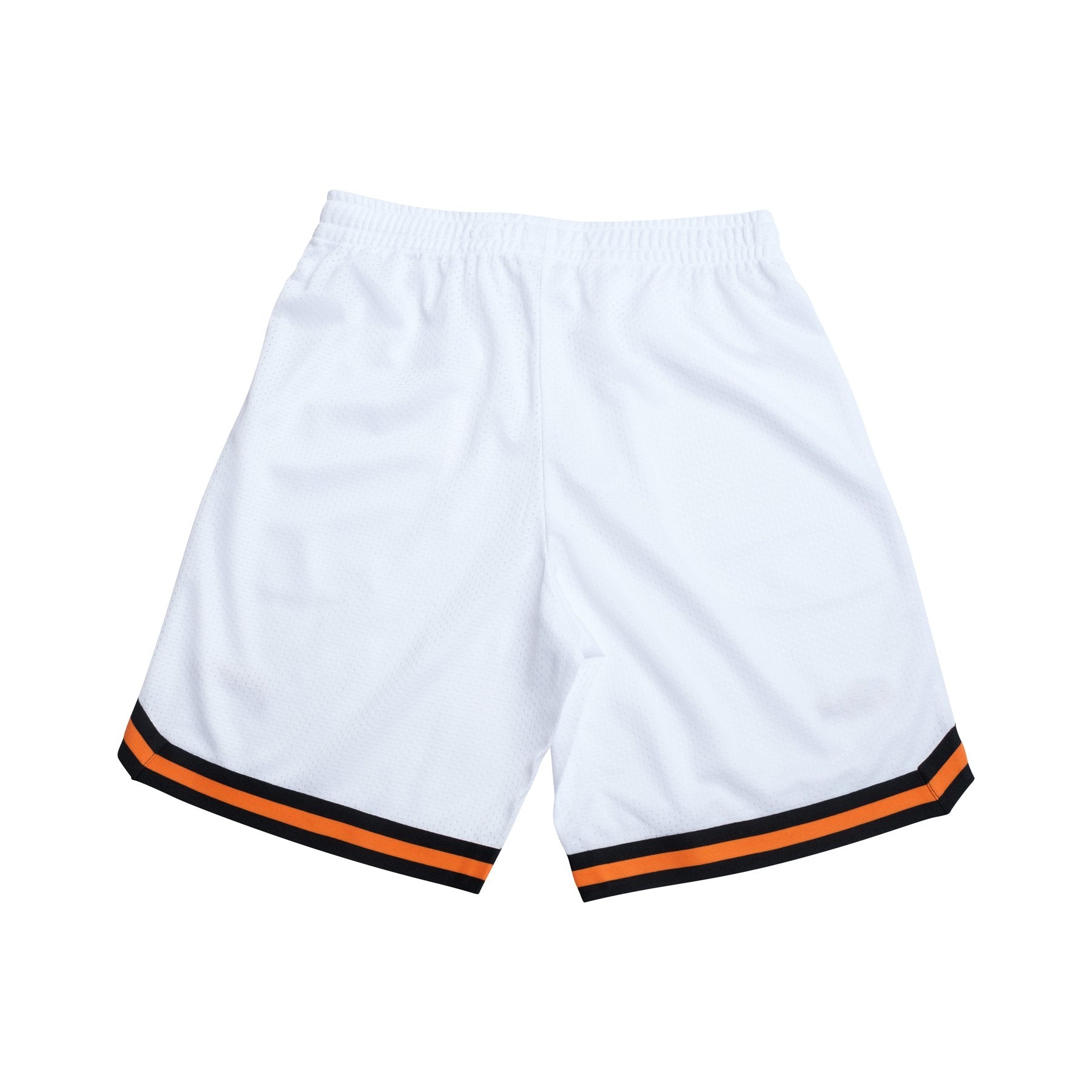 Back view of white shorts with black and orange trim on the bottom