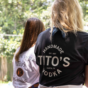 Girl wearing black Tito's All-Time Favorite Tee 