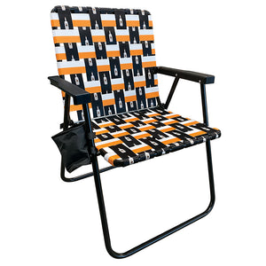 Retro white, black, and orange webbing foldable lawn chair with Tito's branding